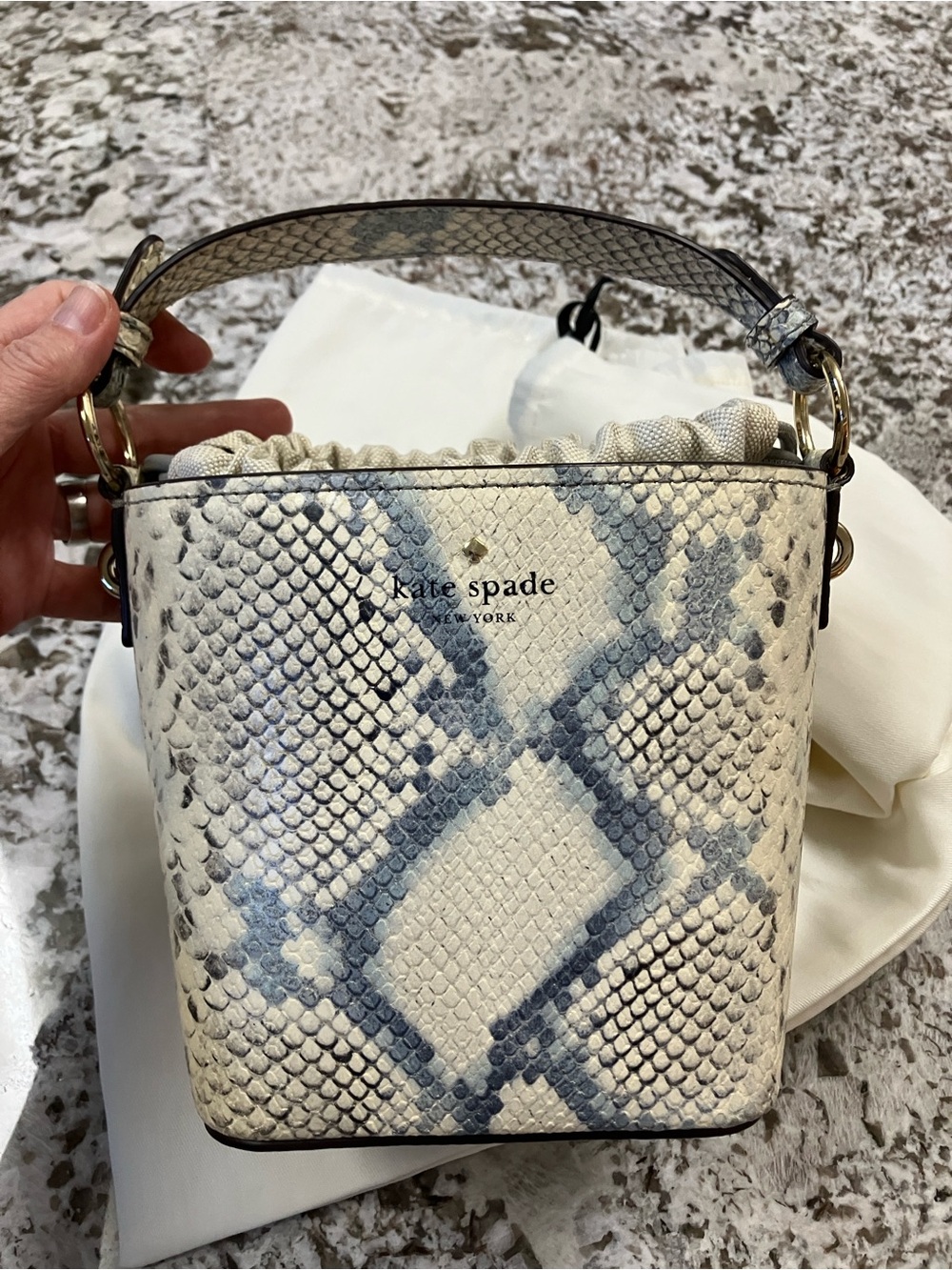 Kate Spade Hayes Street Pippa bucket bag soft morning dawn snake texture
